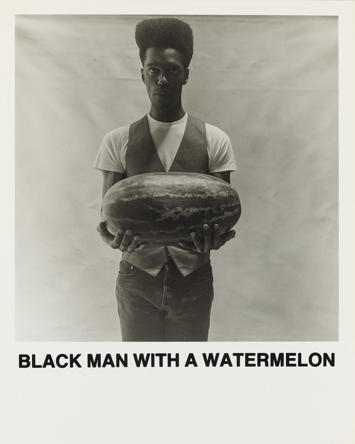 CARRIE MAE WEEMS (1953 -   ) Black Man With A Watermelon.